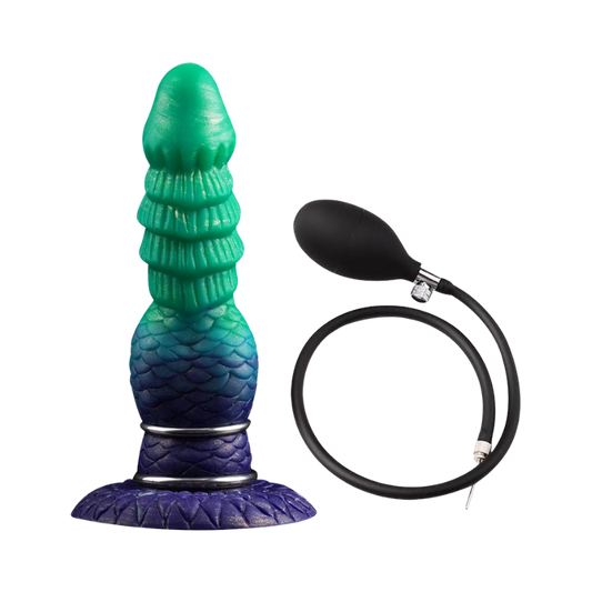 Turquoise and purple silicone dildo with black pump on a white background